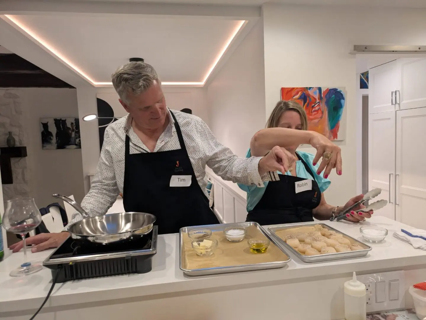 People cooking together in a kitchen.